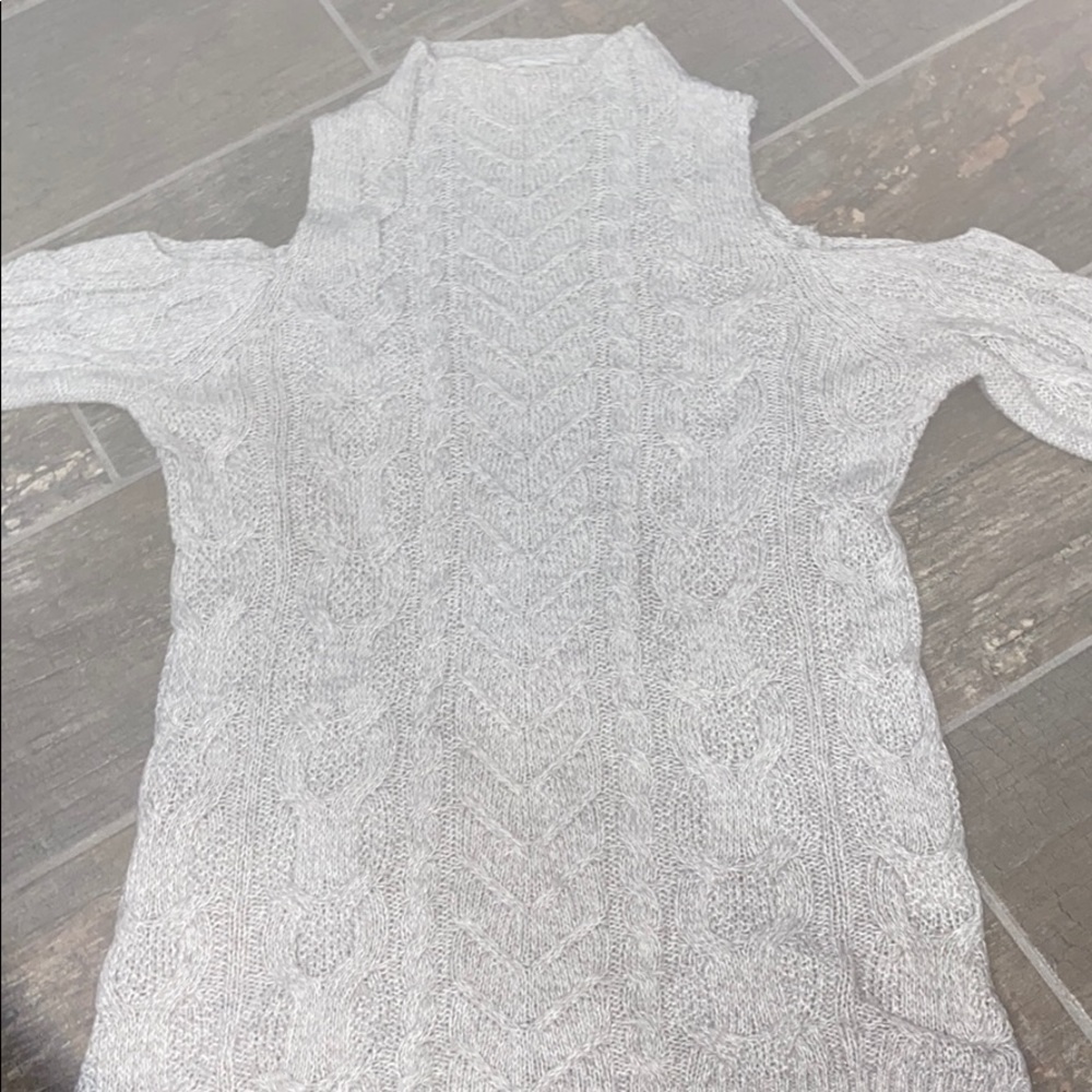 Open shoulder, turtleneck sweater